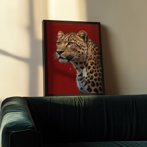 Elegant red aesthetic poster showcasing a leopard with fierce and captivating energy. A perfect addition to contemporary or maximalist spaces. Printable digital artwork.