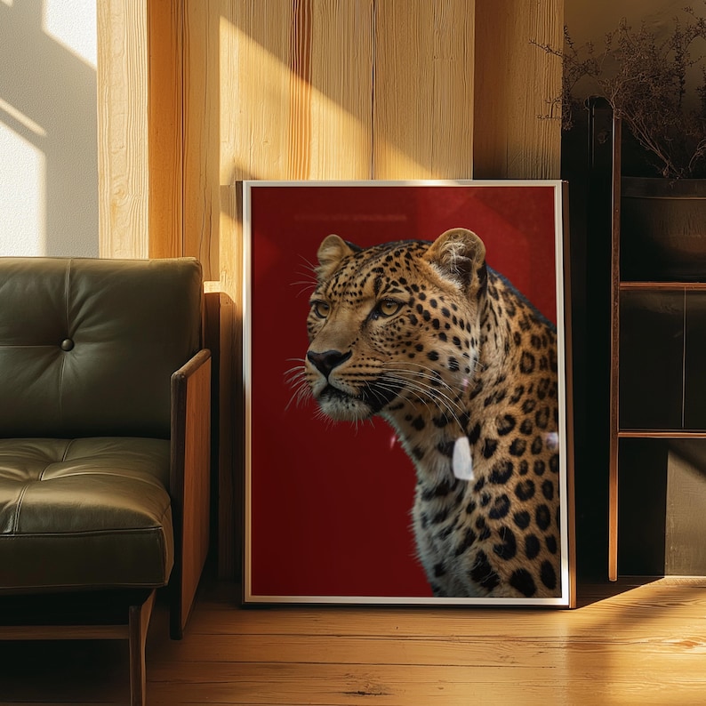 Luxury red poster featuring a close-up of a leopard with striking detail. Perfect for modern, hypebeast, or minimalist decor. Printable digital wall art.
