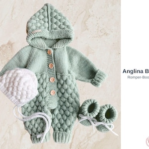 May include: A mint green knitted baby set, including a hooded romper with wooden buttons, a matching cap, and booties. The set features a textured pattern and is designed for newborns.