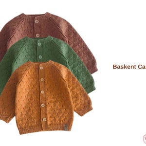 May include: Three button-down knit cardigans in shades of rust, green, and brown. The cardigans have a textured pattern and are displayed on a white background. The text "Baskent Cardigan" is visible.