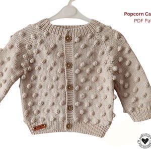 Stickmönster för popcornkofta i PDF-format | Babykofta med raglanmönster | Ok med popcornstygn | Stickmönster för flickor och pojkar - Kofta