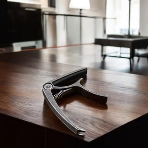 2-in-1 Metal Guitar Capo for 6-String Acoustic, Electric, Bass, Ukulele & Banjo. Durable, Precise, and Perfect for Guitar Tunings