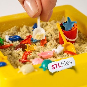 May include: A set of three ceramic mugs with a speckled, matte finish. The mugs are in shades of cream, light brown, and dark brown. Each mug has a simple, minimalist design, perfect for coffee or tea.