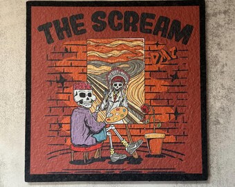 May include: A red and black square coaster with a black border. The coaster features a painting of "The Scream" by Edvard Munch, with a skeleton holding a paintbrush and palette in front of the painting. The text "THE SCREAM" is at the top of the coaster.