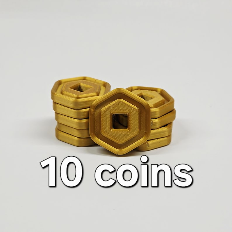May include: Stacks of gold-colored, hexagonal coins with a square center hole. The coins are stacked in groups of five and are labeled with the text "10 coins" in white, bold font.
