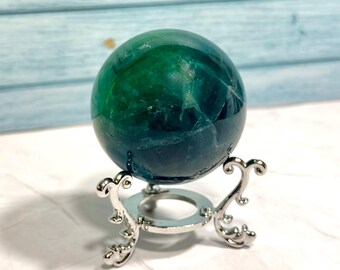 Esfera de fluorita azul verdosa de 50 mm: adorno de cristal pulido