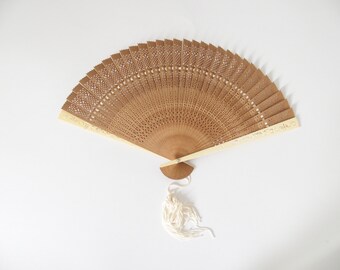 Chinese Style Folding Fan With Cutout Pattern