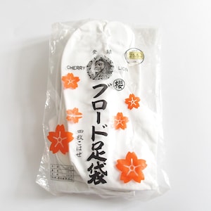 May include: White tabi socks in a clear plastic package, decorated with orange cherry blossom designs. The packaging includes Japanese text and a circular sticker indicating a size of 25.5.
