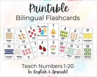 May include: Printable bilingual flashcards for teaching numbers 1-20 in English and Spanish. Each card features a number with a corresponding illustration, such as strawberries for the number five. The cards are designed with a colorful, playful aesthetic.