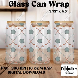 May include: Three clear glass can wraps with golf-themed designs. Each wrap features a pattern of crossed golf clubs and golf balls. The wraps have bamboo lids and glass straws. The text "Glass Can Wrap" and dimensions 9.75" x 4.5" are visible.