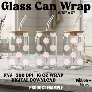 May include: Three clear glass can wraps with bamboo lids, each featuring a pattern of pink circles with teal stems and red bows. Each can has a clear straw. The text "Glass Can Wrap" and "9.75" x 5"" is at the top.