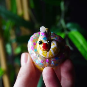 Party clown ball python figure