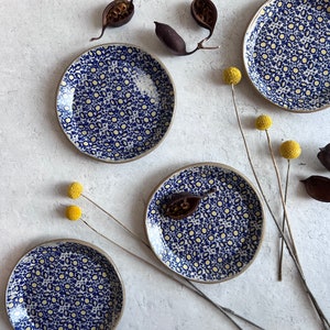 Floral stoneware plate set, set of four ceramic plates