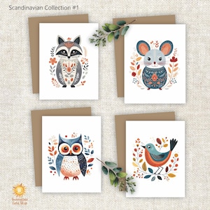 May include: Four white greeting cards from the Scandinavian Collection #1, each featuring a colorful illustration of a woodland animal—a raccoon, mouse, owl, and bird—surrounded by floral and leaf motifs, paired with brown envelopes.