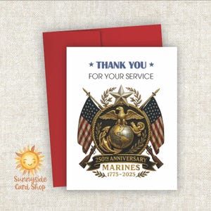 May include: A white greeting card with a red envelope. The card features the text "THANK YOU FOR YOUR SERVICE" above a gold emblem with an eagle, globe, and anchor, flanked by American flags and rifles. The card commemorates the 250th Anniversary of the Marines.