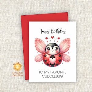 May include: A birthday card with a red envelope. The card features a cute ladybug illustration with the text "Happy Birthday" and "To My Favorite Cuddlebug". The card has a watercolor style.