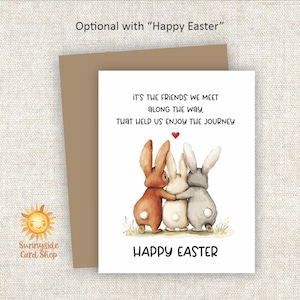 May include: An Easter greeting card featuring three hugging bunnies in shades of brown, white, and gray. The card includes the text "It's the friends we meet along the way, that help us enjoy the journey" and "Happy Easter."