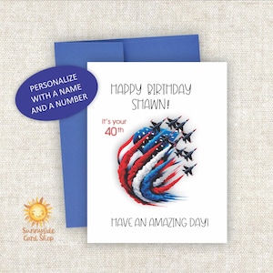 May include: A white birthday card with a blue envelope. The card features the text "Happy Birthday Shawn!" and "Have an Amazing Day!" with an illustration of jets and the American flag. The card is for a 40th birthday and can be personalized.