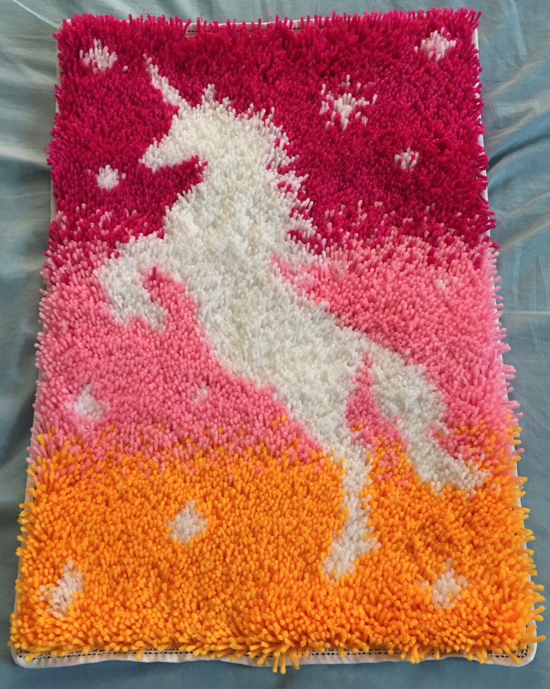 Completed White Unicorn Latch Hook Rug in Dark Hot Pink, Pink, and