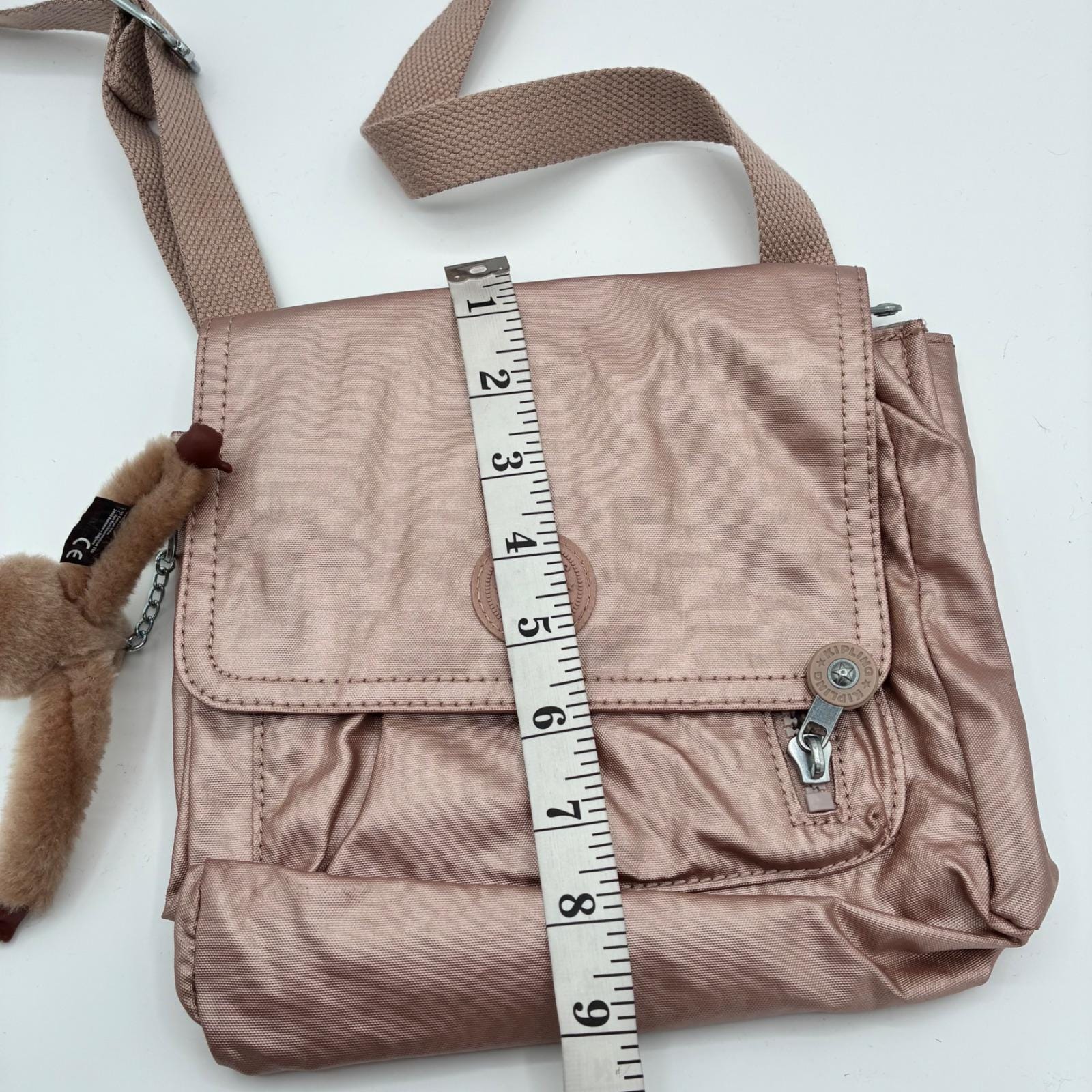 Kipling Metallic Gold Drawstring Backpack with Monkey Charm Kipling KI0954 Alexis Crossbody Bag Metallic Rose Gold  main image 4