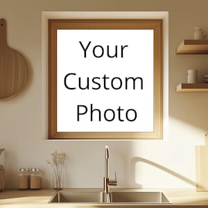 May include: A kitchen with a window above the sink. The window has a white frame and a white background with the text "Your Custom Photo" in black.