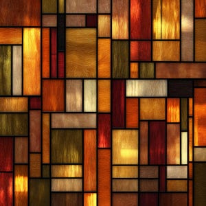 May include: Abstract geometric pattern with a stained glass effect. The design features a mosaic of rectangular and square shapes in shades of gold, orange, red, brown, and cream, outlined with black lines. The texture appears to be a mix of smooth and textured surfaces.
