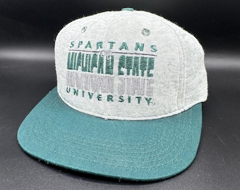 Gorra snapback vintage de los Spartans de Michigan State, gris y verde, con diseño Spellout, fabricada en EE. UU.