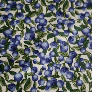 Blueberry print fabric on a white background