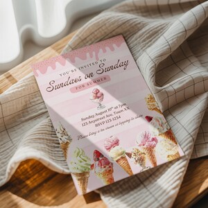 May include: A rectangular invitation card with a light pink striped background and a dripping frosting design at the top. The text reads: YOU'RE INVITED TO Sundaes on Sunday FOR SUMMER, Sunday August 10th at 7pm, 123 Anystreet Ave, Town XX, RSVP 123-1234, Please bring a ice cream or topping to share. The card features illustrations of various ice cream cones and sundaes.