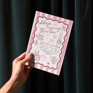 May include: A pink and white striped invitation card with the text "She's turning thir-tea" and "you're invited". The card includes illustrations of teapots, teacups, and a cake. The invitation is for Erin's 30th party.