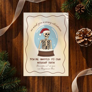 May include: A holiday invitation with a snow globe design featuring a skeleton wearing a Santa hat. The text reads "We wish you a scary Christmas" and invites guests to a holiday bash on December 20th at 7 pm.