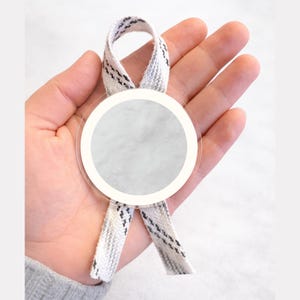 May include: A rustic wooden sign with the text "Welcome to our home" in white lettering. The sign features a distressed finish and a simple, inviting design, perfect for entryway decor.
