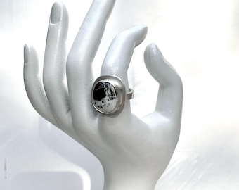 Handcrafted sterling silver ring with white buffalo turquoise.