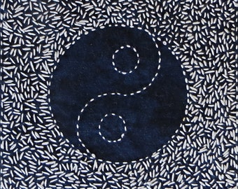 Sashiko YIN YANG stitchery indigo blue and white mounted on flax linen background yin-yang yinyang