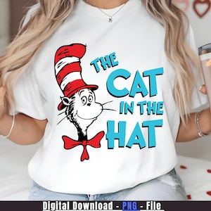 May include: White t-shirt featuring a graphic of the Cat in the Hat character with his signature red and white striped hat and a red bow tie. The text "THE CAT IN THE HAT" is in blue letters.