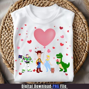 May include: White t-shirt featuring a pink heart balloon and cartoon characters. Buzz Lightyear, Woody, and other characters are holding hands. Red and pink hearts are scattered across the shirt. The text "Digital Download - PNG File" is at the bottom.