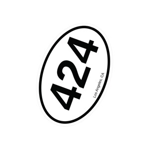 May include: Oval sticker with the number "424" in bold black font, centered within a white oval. The oval is outlined in black. The text "Los Angeles, CA" is printed in a smaller font along the right side of the oval.