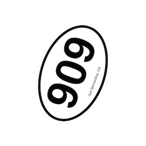 May include: White oval sticker with black text. The text reads "909" and "San Bernardino, CA".