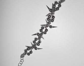 PULSERA DELTA: Pulsera de acero inoxidable con piercing de punta, estilo gótico, alternativo, de malla, con dije cromado, estilo emo grunge, de modmize