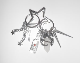 LLAVERO ESTRELLA — Llavero con mosquetón de estrella inspirado en el charm Y2K con doble eslabón - por modmize