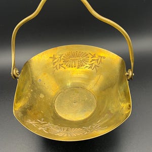 vintage brass basket with floral design
