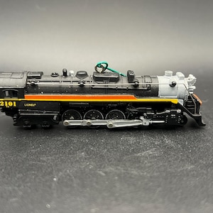 Vintage Hallmark Keepsake Lionel Chessie Steam Special Locomotive and The Tender from 2001.