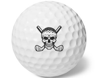 May include: White golf ball with a black skull and crossed golf clubs design. The golf ball has a dimpled surface. The skull has detailed features, and the clubs are positioned below the skull.
