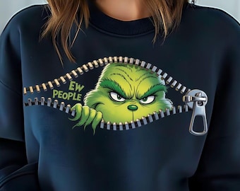 May include: A dark navy blue crewneck sweatshirt featuring a graphic of a green, furry creature peeking through an open zipper. The text "EW PEOPLE" is printed in light green letters next to the creature, which has a grumpy facial expression.