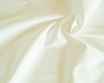 Ivory organic cotton sateen. 146g/m2. 100% Organic Certified Cotton GOTS. Organic sheeting by 1/2 meter.