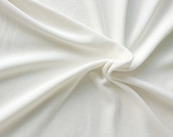 White velour fabric in organic cotton. 100% organic cotton fabric in without optical brightener. Ivory velour by the 1/2 meter.