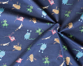 Colorful monsters on navy blue jersey in organic cotton. Knitted fabric for little boy or girl by half meter (50cm)