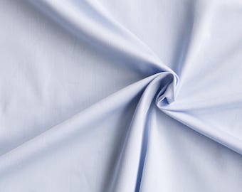 Light blue organic cotton sateen. 146g/m2. 100% Organic Certified Cotton GOTS. Organic sheeting by 1/2 meter.