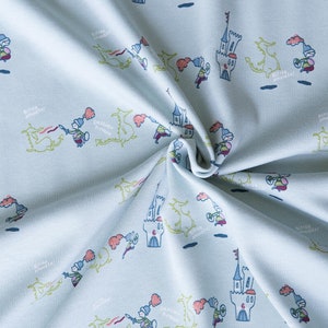 Small knight with dragon on blue Interlock in organic cotton. Knitted fabric for little boy by half meter (50cm)
