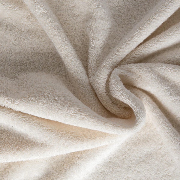 Tissu éponge naturel. Métrage de d'éponge crème 100% coton biologique, 50cm.